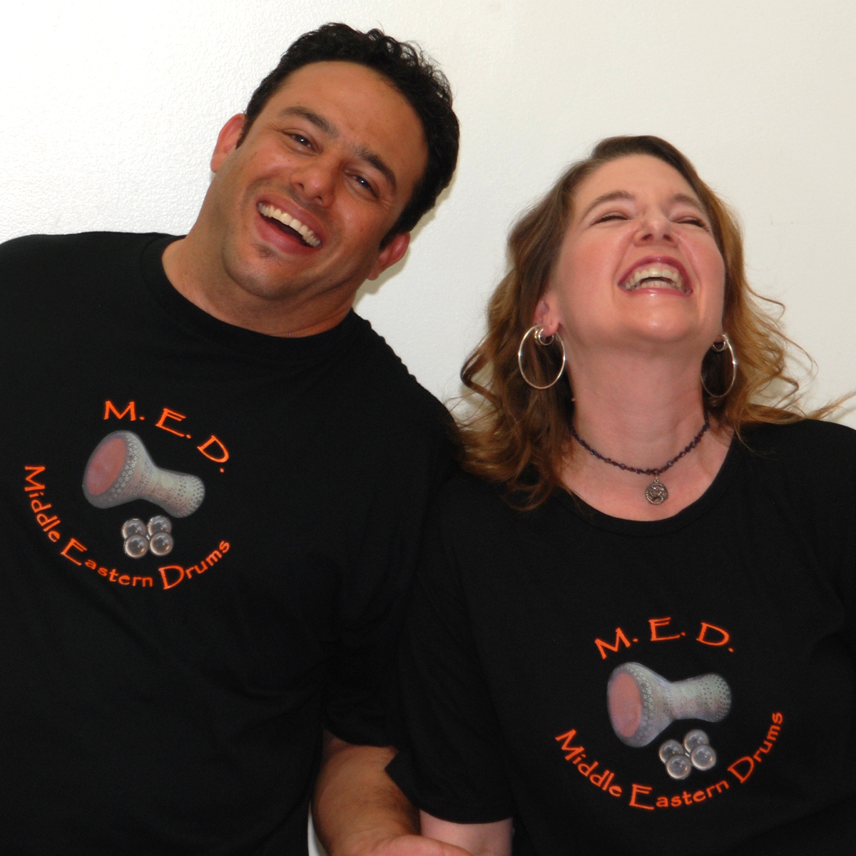 Amr & Angelina model Percussion on Fire T-Shirts